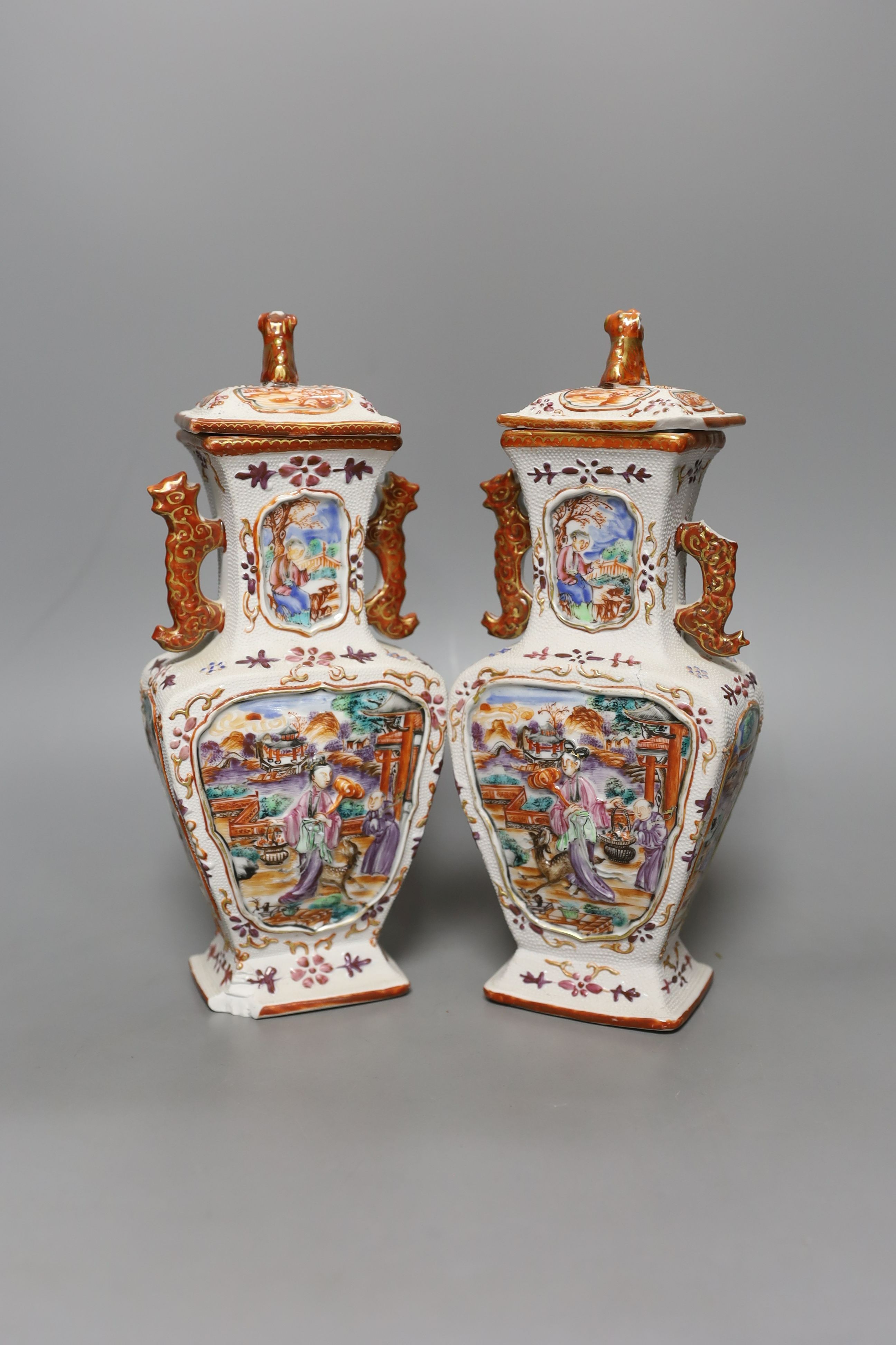 A pair of 18th century Chinese export square form famille rose vases and covers with phoenix handles - 24.5cm tall